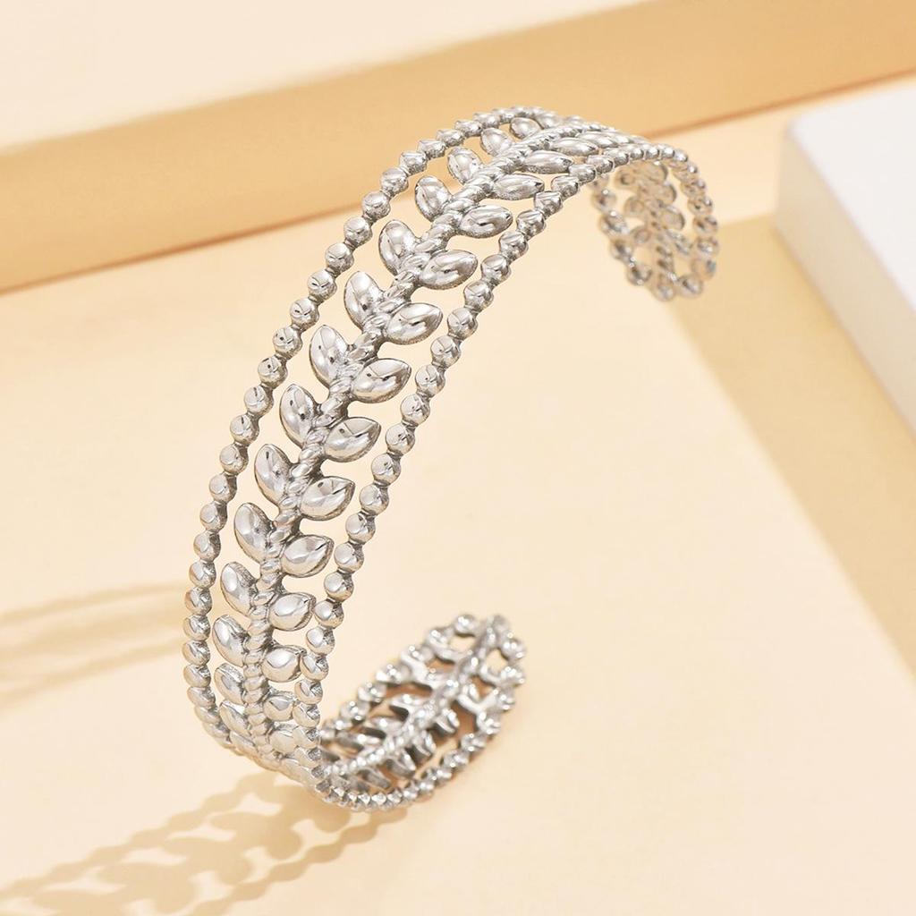 Elegant Hollow Leaf Open Stainless Steel Women's Bracelet with 18K Gold Vacuum Plating