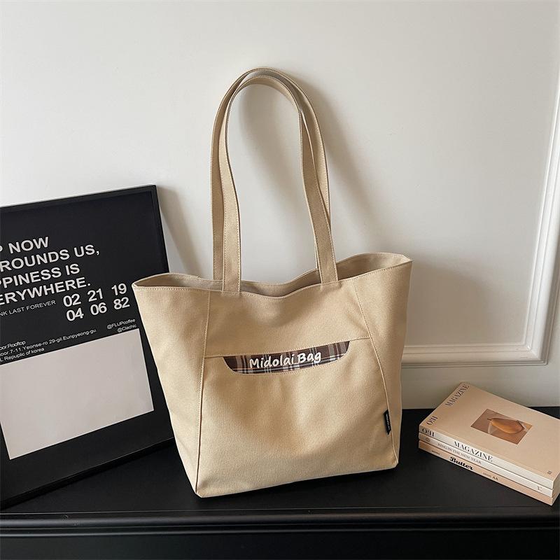 New Fashi Large Capacity Canvas Simple Shoulder Bag Women Casual Commuting Bag Fashiable and Versatile Tote Bag Ins Style