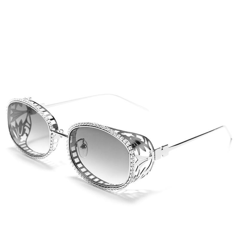 New steampunk-style hollow metal oval sunglasses with a futuristic design, featuring a unique and trendy handmade chain and available in multiple