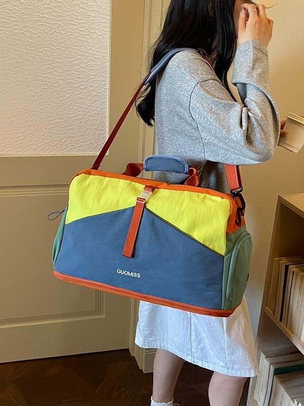 Trendy Color Block Fitness Travel Bag with Wet/Dry Separation, Large Capacity, and Handheld Design.