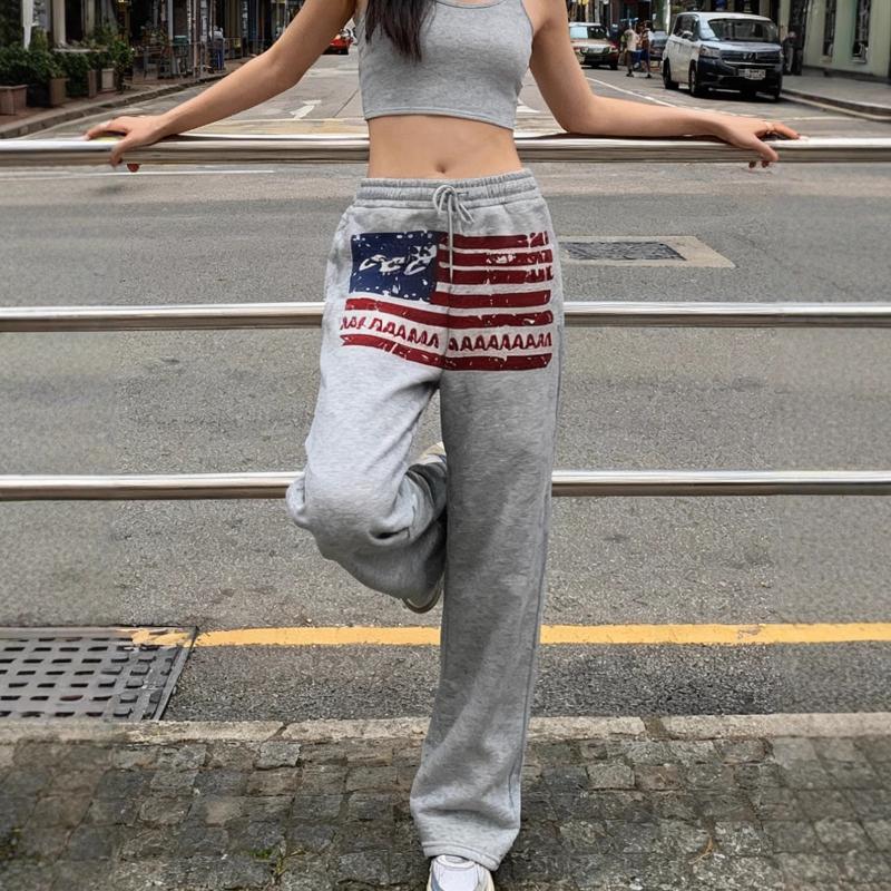 Evropská a americká podzimní a zimní pouliční móda, potištěné volné provedení, dlouhé dámské ležérní kalhoty