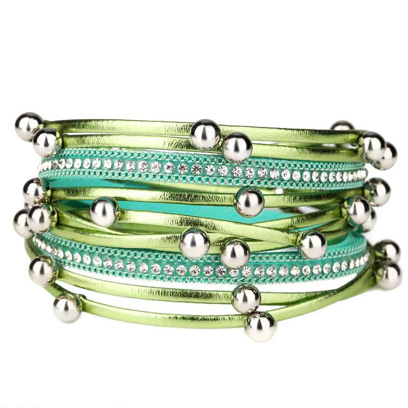 

Богемский многорядный браслет из бисера и кожи с магнитной застежкой зелёный