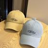 Korean-style fashion yellow letter embroidery Korean-style washed cotton baseball cap for young couples, suitable for outings, unisex sun hat