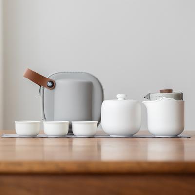 Grobkeramik einfach und tragbar Kung Fu Reise-Teegeschirr Kuaike Tasse ein Kännchen vier Tassen Geschäfts-Souvenir