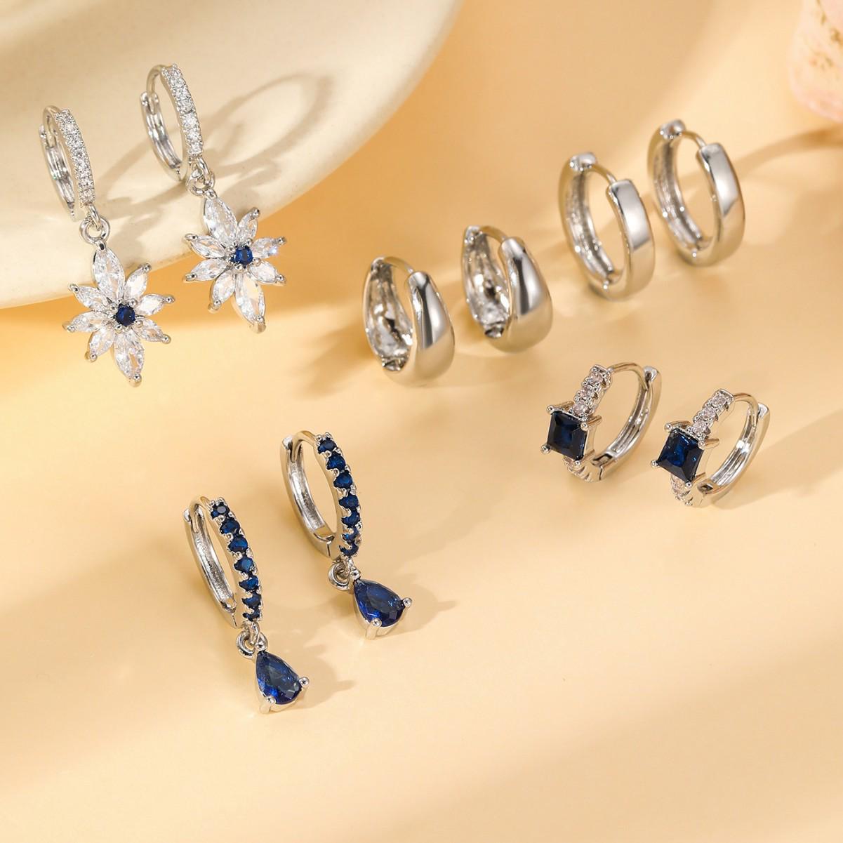 

Европейско-американская мода: Набор кафф для ушей и серег с белыми цирконами-снежинками