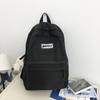 High-value schoolbag female Japanese ins large-capacity backpack solid color high school college student simple backpack