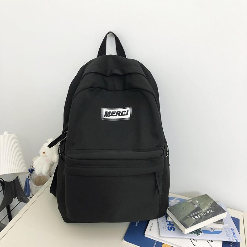 High-value schoolbag female Japanese ins large-capacity backpack solid color high school college student simple backpack