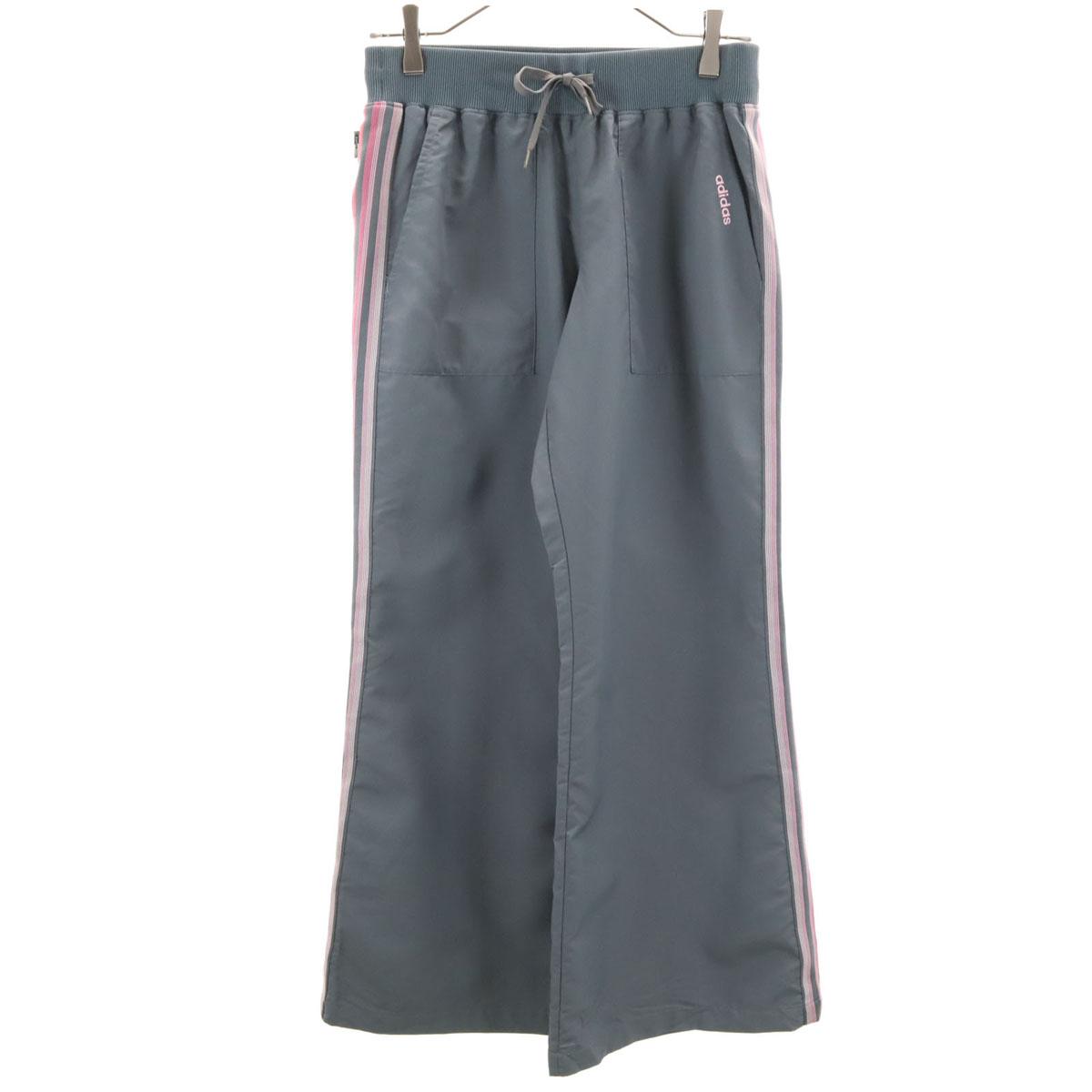 

adidas Расклешенные спортивные брюки L серый Женские Б/у