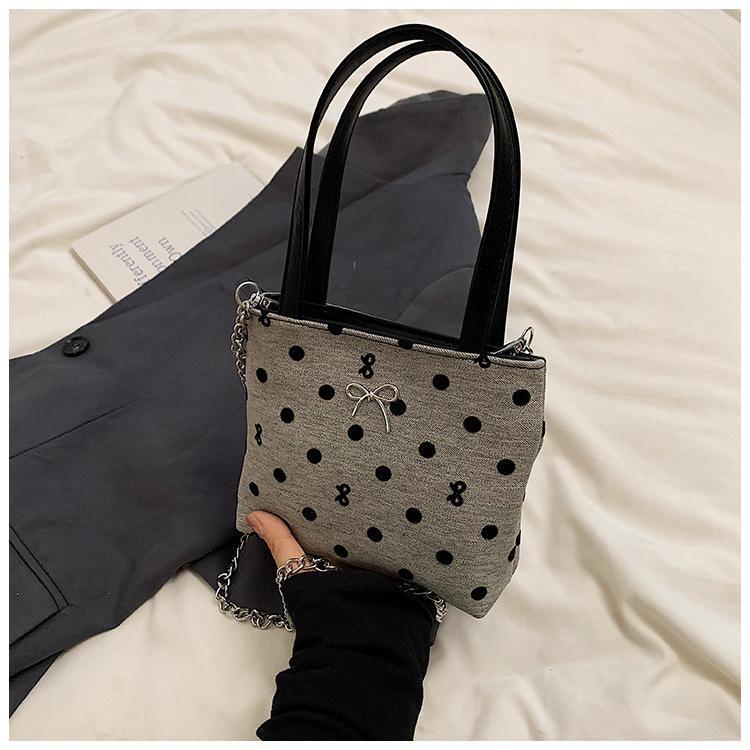 

Повседневная холщовая сумка-ведро в горошек 2025 новая женская нишевая популярная универсальная в иностранном стиле для поездок на работу ручная/на плечо светло-серый