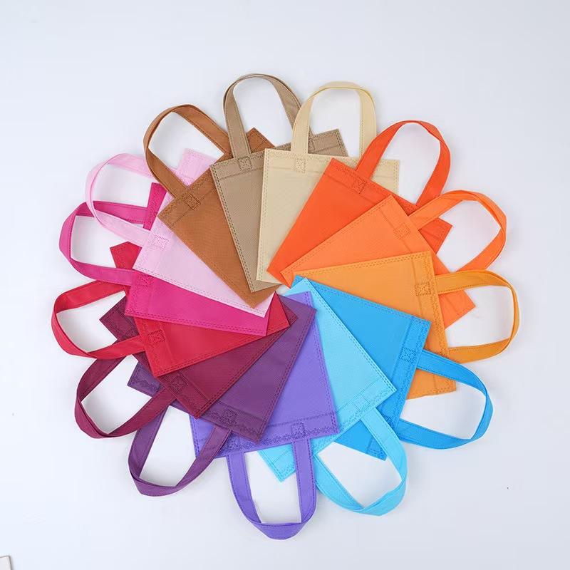 10 Pieces Colorful Small Non Woven Party Favor Bag random style Gift Bag with Handle for Birthday Party Gift Bag