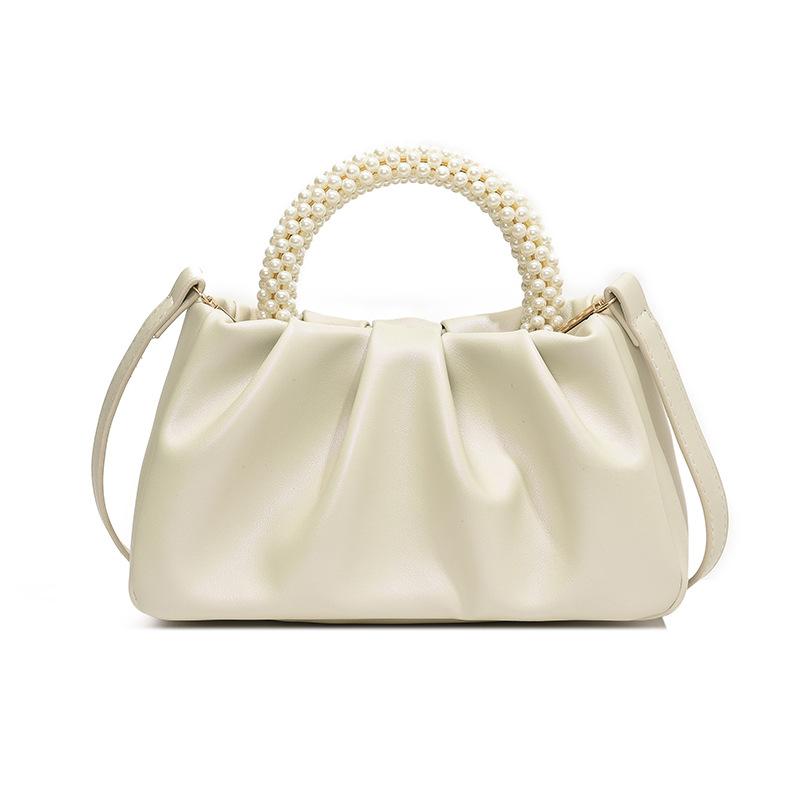 

Больше. Новая жемчужная портативная сумка-мессенджер через плечо от Bao