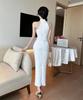Elegant Off-Shoulder Qipao Evening Gown with Pearl Chain Accents