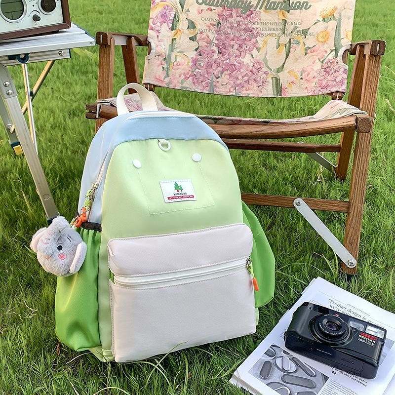 Schoolbag Korean version ins casual versatile backpack schoolbag new contrasting color niche large-capacity backpack primary school girls schoolbag