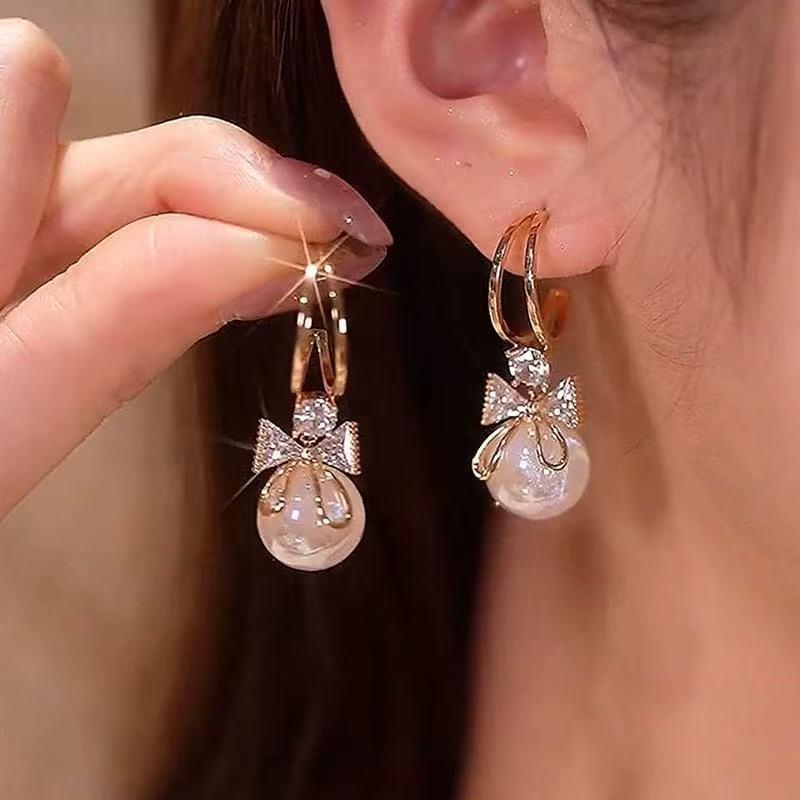 

New Silver Needle Mermaid Ji Pearl Earrings Women s, French Elegant Minimalist Bow Internet celebrity earrings золотой