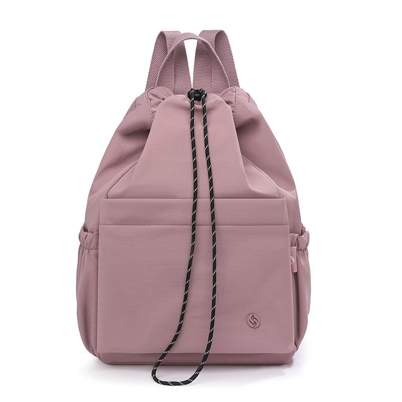 Schoolbag versatile backpack large-capacity design sense commuting travel large-capacity schoolbag waterproof and wear-resistant backpack wholesale