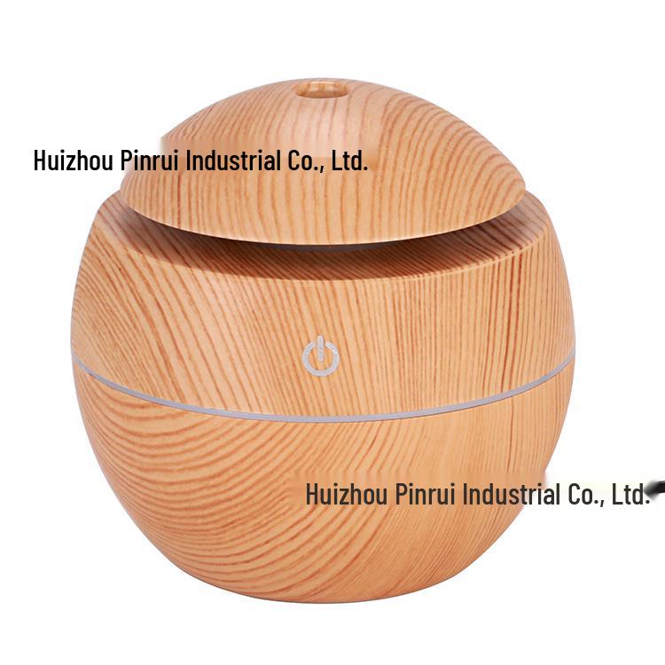 130ml Mini Mushroom Ultrasonic Aroma Diffuser: Seven-Color USB Humidifier with Round Wood Grain Design.