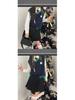 Niche Design College Style High-Waist Irregular Mini Skirt for Spring/Summer
