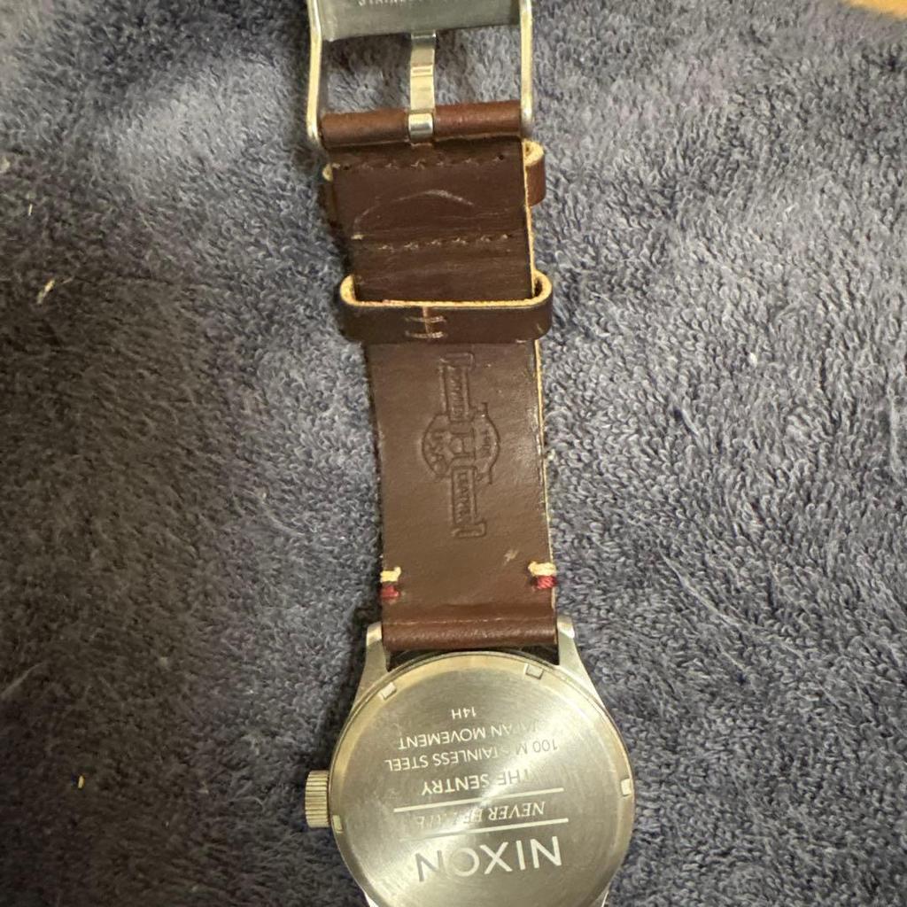 Used Nixon watch price reduction