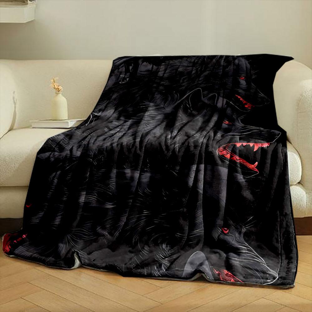 The pattern features dark wolves with red eyes and red snarling mouths on black. for all seasons blanket lunch break throw gift