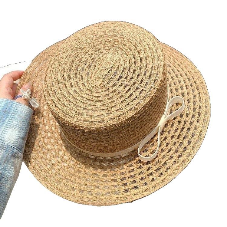 French bow flat top straw hat women's summer hollow breathable flat brim seaside beach vacation sun hat