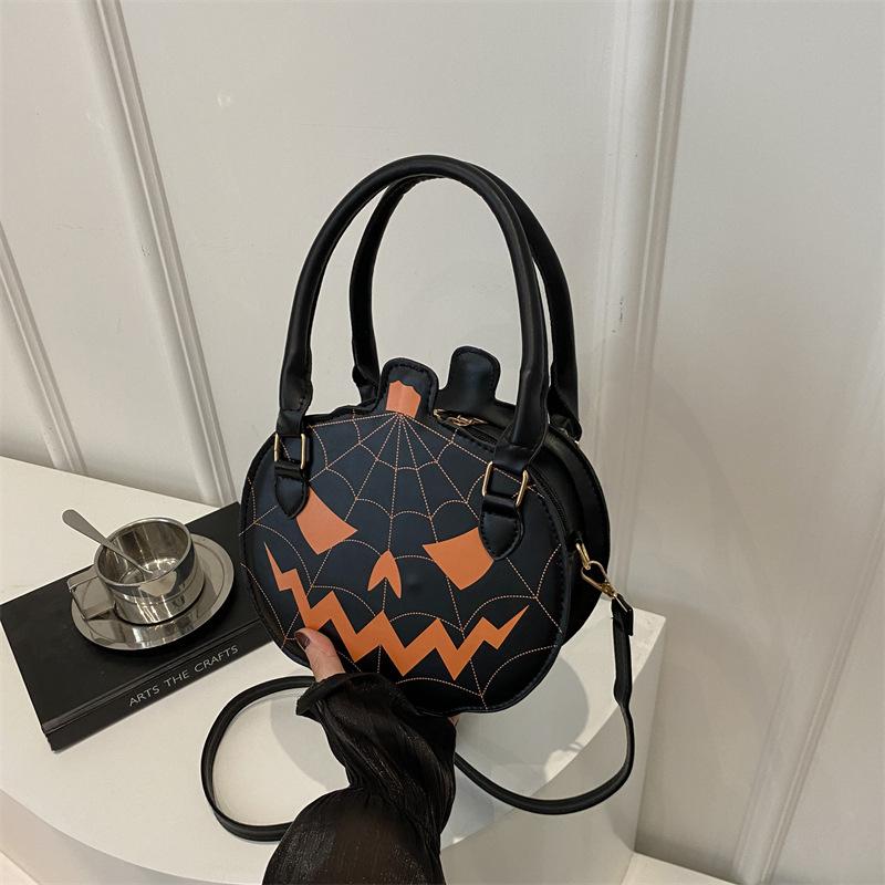 Halloween bag 2025 new contrasting color women's bag simple shoulder small round bag funny pumpkin bag women's bag