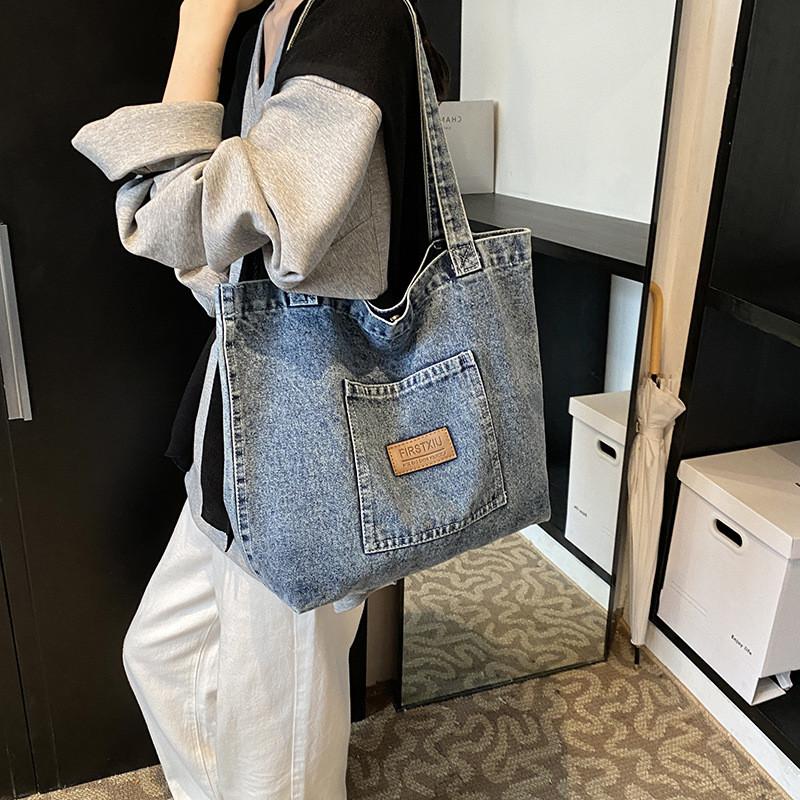 Fashionable Medium Sized Denim Tote Bag With Unique Stitching Details For Everyday Use