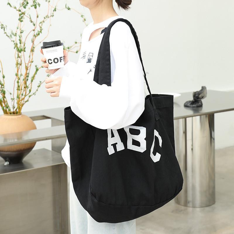 IELGY Японская повседневная холщовая сумка модная сумка с буквенным принтом чёрный 2719₽