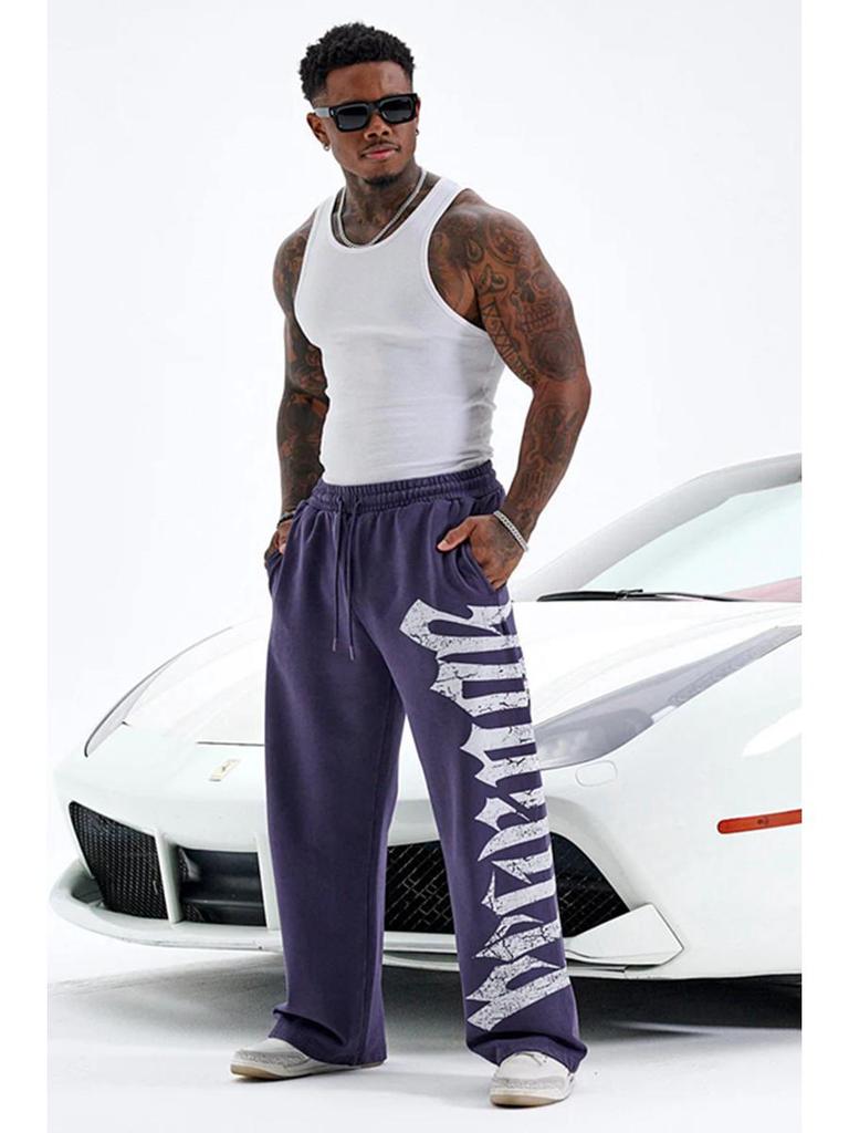 Pánské tepláky se širokými nohavicemi a velkým potiskem - Ležérní módní joggery