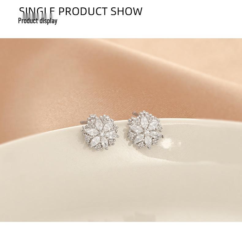 Banyan Tree S925 Silver Snowflake Earrings: Rotatable, Diamond-Studded, Luxury Winter Trend for Women.