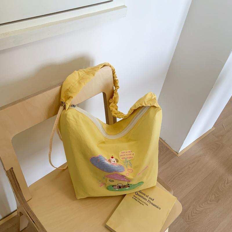 

Bag Large capacity women s armpit bag 2025 new cartoon printed bucket bag casual lazy wind nylon canvas bag жёлтый