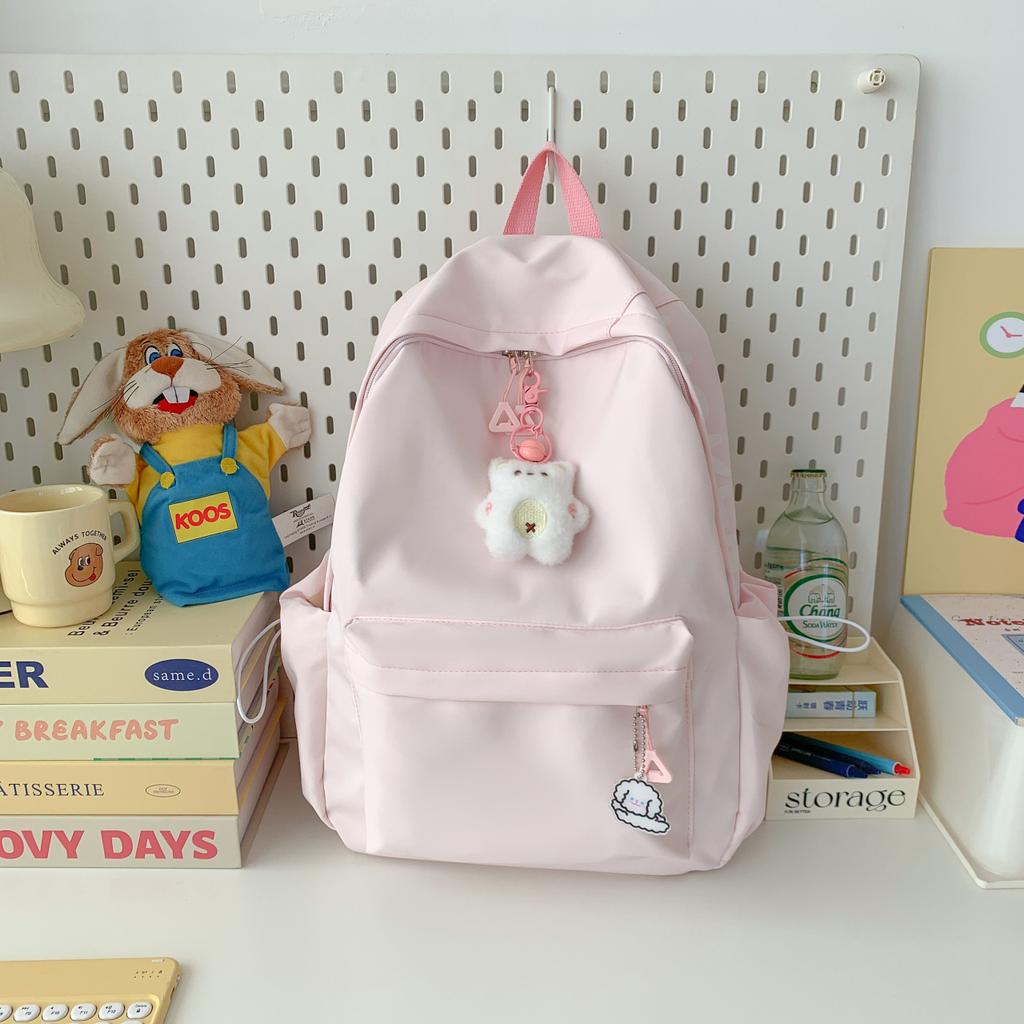 Summer Korean version fresh solid color casual size backpack large capacity primary and secondary school students go out to play small backpack