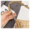 Lightweight Tassel Underarm Bag: Trendy Retro Saddle Design with Versatile Studded Details for Autumn and Winter Fashion
