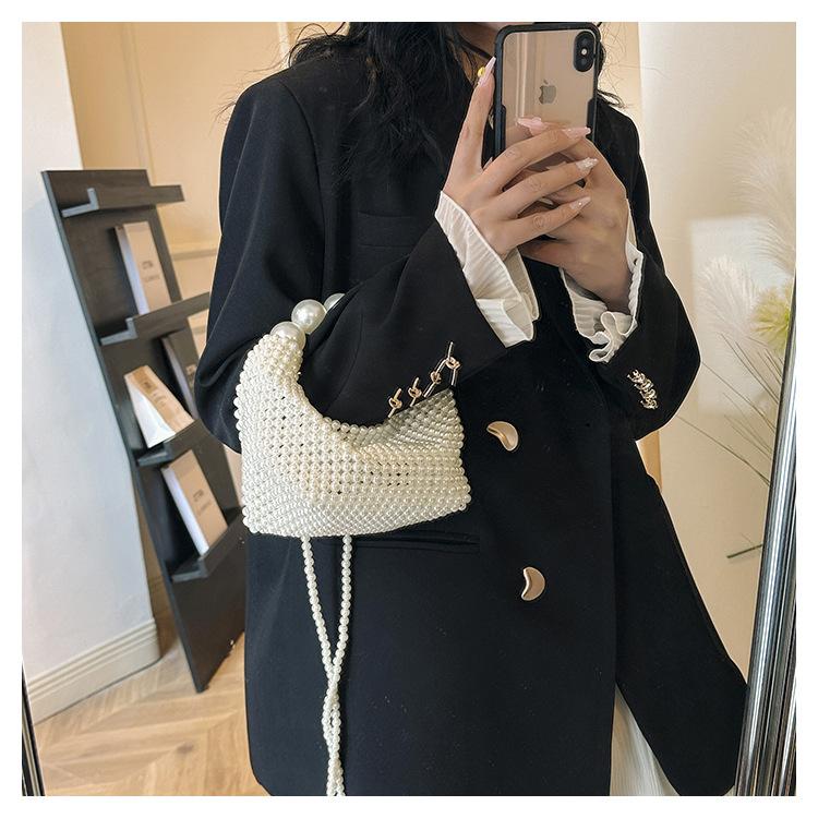 Pure hand-woven dinner bag female retro fairy pearl bag trendy large capacity portable shoulder bag