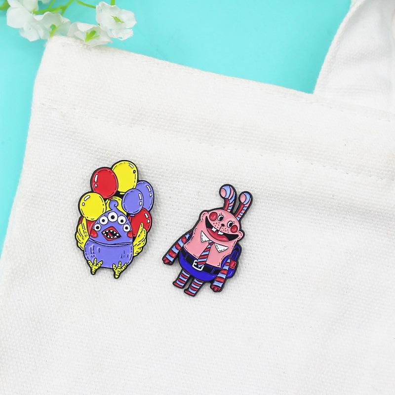 Little Rabbit Student & Mama Bird Balloon Seller Cartoon Brooch