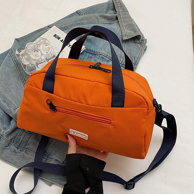 

Crossbody bag women s nylon cloth 2025 summer 2025 casual new style simple summer new portable tote bag помаранчевий