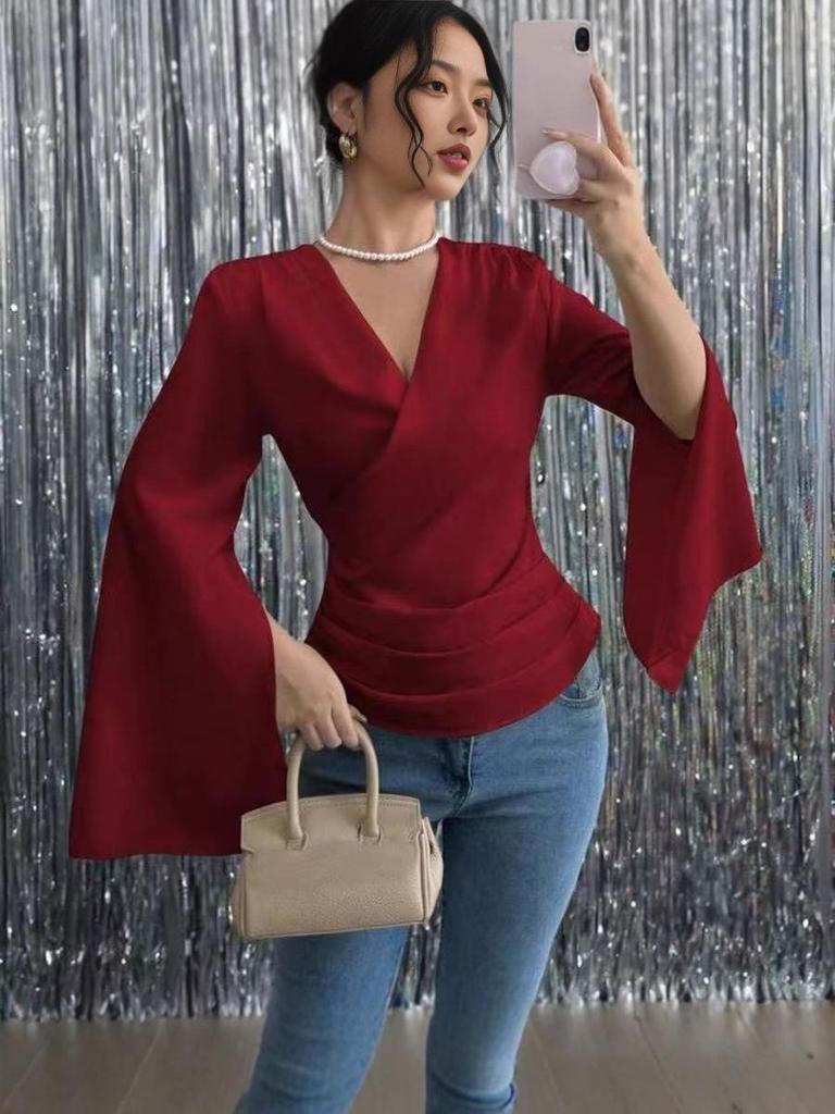 2025 Autumn Elegant Cross-Neck Long-Sleeve Pleated Top with Split Flare Sleeves.