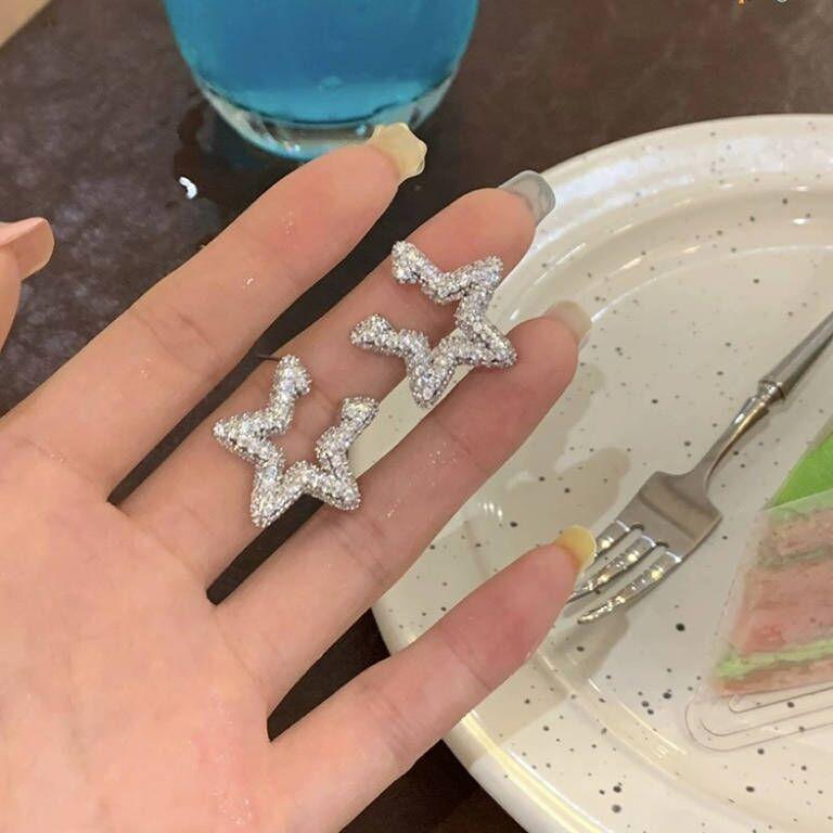 

Sweet and cool shining stars, zircon earrings, new popular light luxury niche earrings, design sense, high-end earrings, women