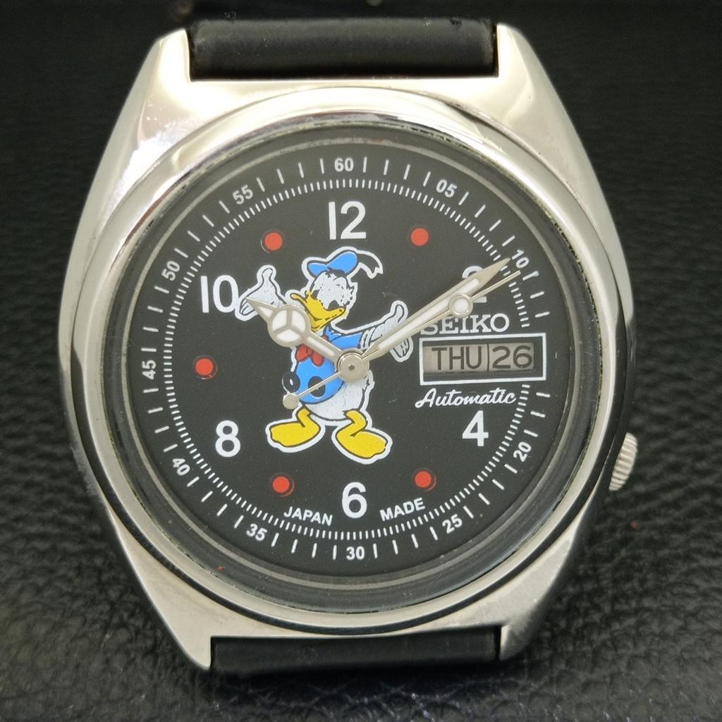 USED VINTAGE SEIKO AUTOMATIC 7009A JAPAN MENS CARTOON BLACK DIAL WATCH a433911-2 R119-a433911
