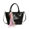 Trendy new cute embossed Korean version of high-end portable bucket bag casual versatile travel commuter messenger bag woman