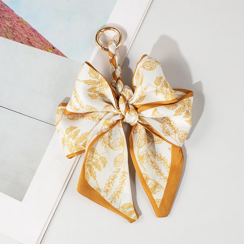 Luxury Bow Chain Bag Charm: Trendy Crossbody Strap and Elegant Pendant Accessory for Influencers