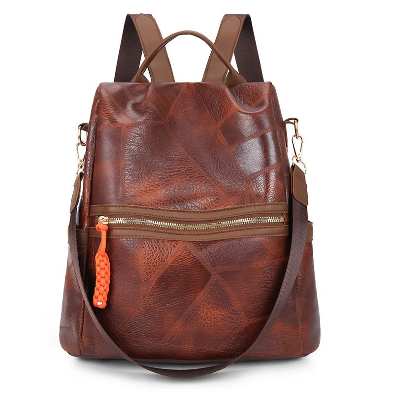 Schoolbag splicing pattern imitation leather texture women's shoulder bag 1011 new multi-functional anti-theft casual backpack women's bag backpack