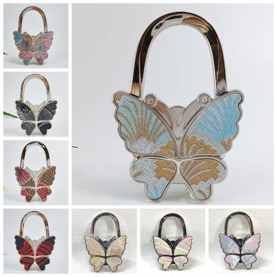 Táska kiegészítők – Horgok táskák akasztásához
