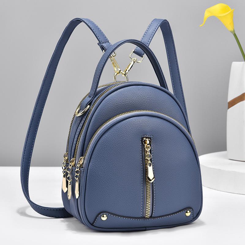 Malá taška Módní korejská verze Trendy Malý batoh Simple Atmosphere Jedno rameno Crossbody Malá kulatá taška Dvojité rameno Dámská taška