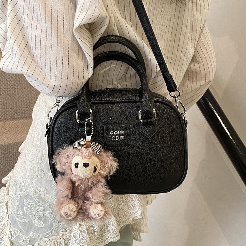 Early Spring Hot Sale French Niche Fashionable Portable Bowling Bag Solid Color Versatile Temperament Advanced Sense Messenger Women's Bag