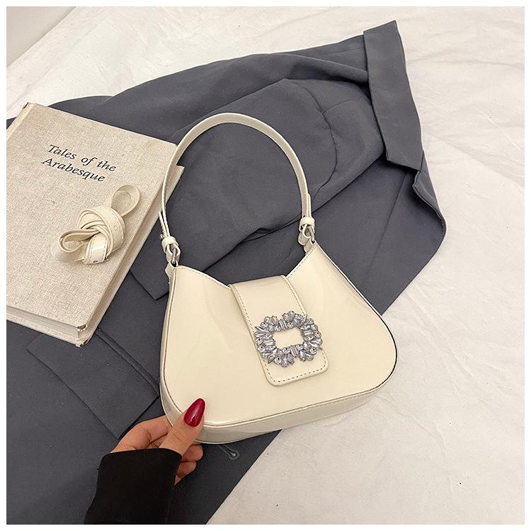 

Light luxury fashion underarm bag women 2025 foreign style fashion niche high-end shoulder bag versatile messenger bag білий