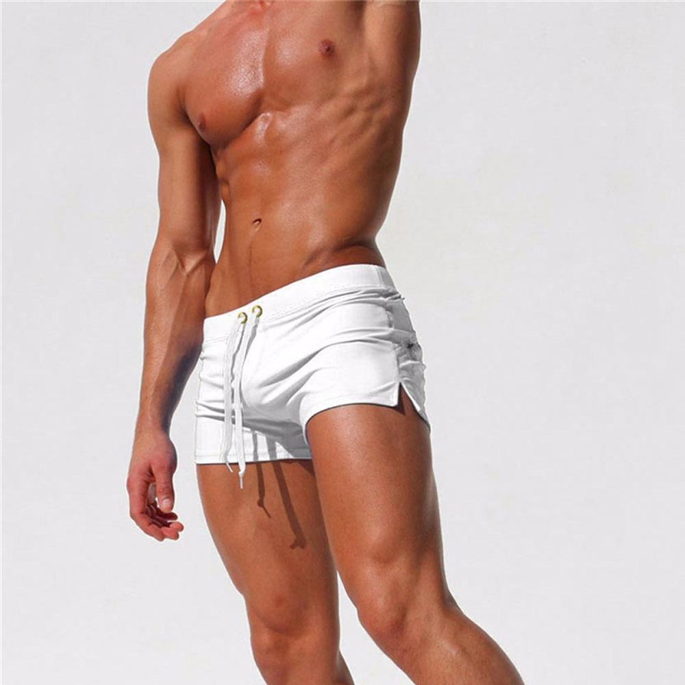 Summer men's solid-colored swimming trunks, loose men's shorts side-split zipper drawstring swimming trunks, back pockets, sports vacation beach pants