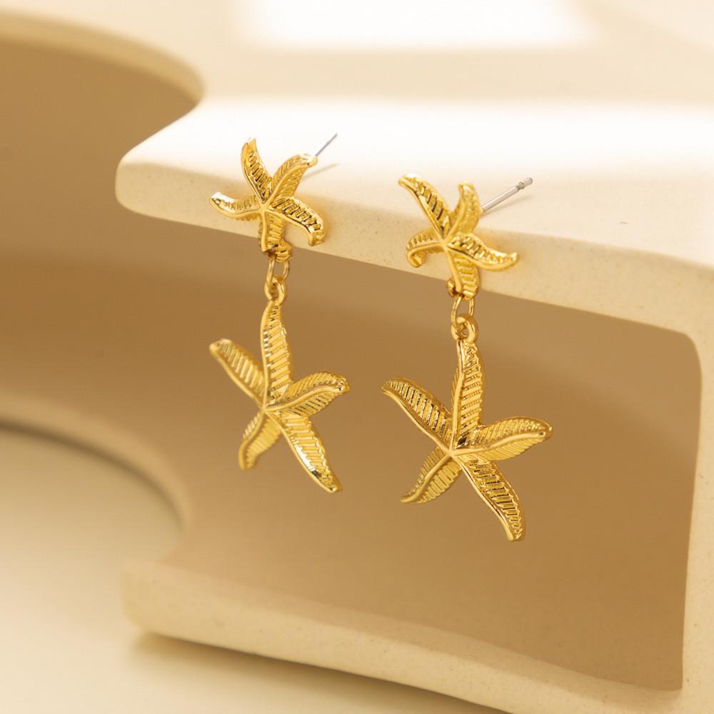 Trendy Gold Plated Starfish Earrings Stylish Gold Alloy Star Shape Earrings For Women For Autumn