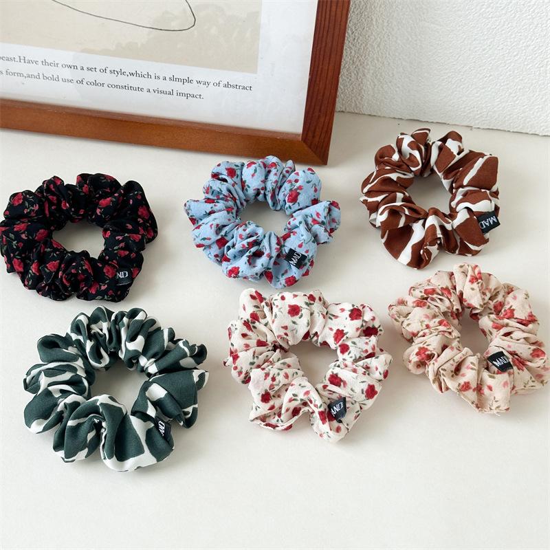 Fresh and Light Floral Fabric Hair Band for Loose Braided Hairstyle in Summer - A Stylish Ponytail Hair Accessory Made of Elastic Band.