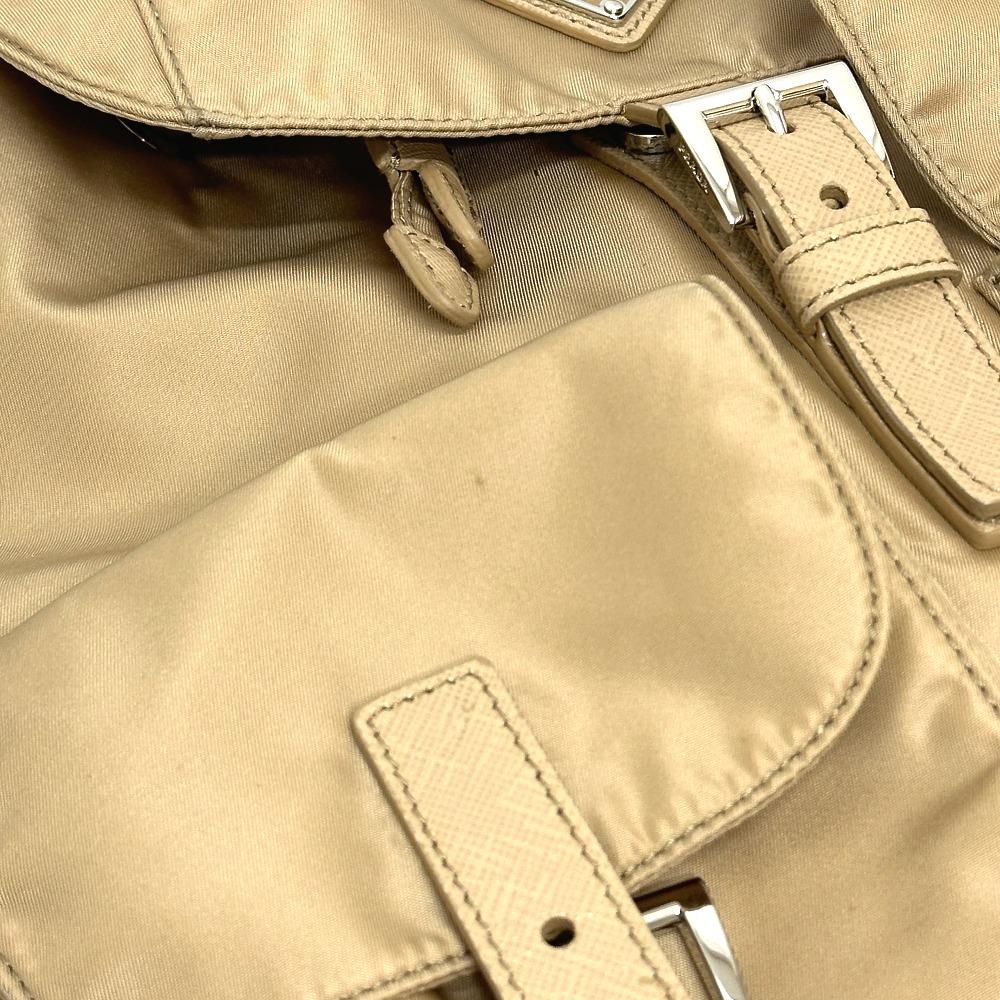 PRADA 1BZ811 Triangle logo Backpack with double pockets and pouch Nylon Beige