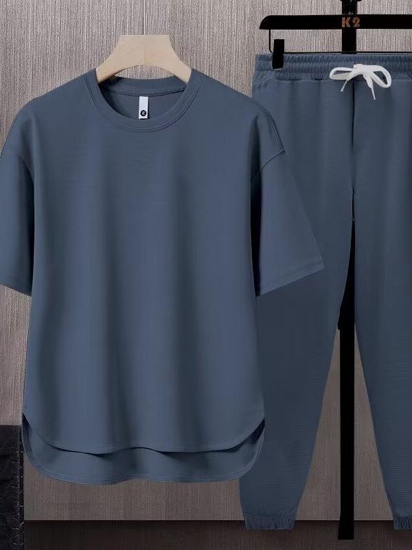 Set da uomo a due pezzi tinta unita tendenza giapponese: T-shirt a maniche corte e pantaloni lunghi (Estate 2025)